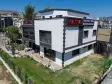 ÇİĞLİ’DE ANADOLU CADDESİNE YAKIN SATILIK KOMPLE BİNA