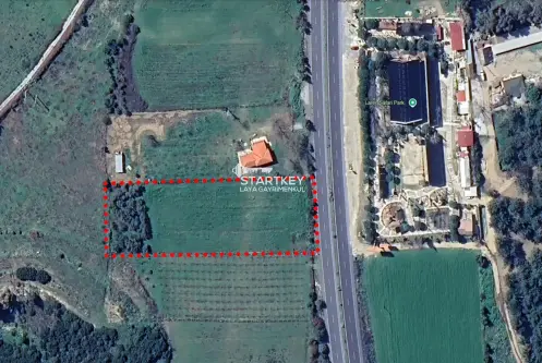 KUŞADASI-SELÇUK KARAYOLUNA CEPHELİ 6.165 m² SATILIK TARLA