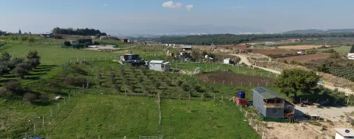 İZMİR OĞLANANASINDA SATILIK 500 M2 TAPULU ETRAFI ÇEVRİLİ MANZARALI HARİKA BAHÇE