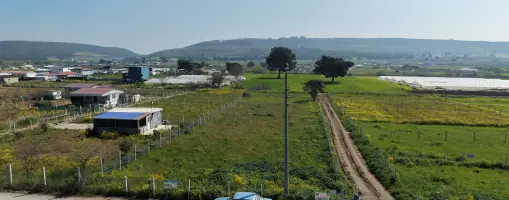 DEVELİDE SATILIK 1.050 M2 RESMİ TAPULU İZBANA YAKIN ASFALT CEPHELİ KÖŞE TARLA