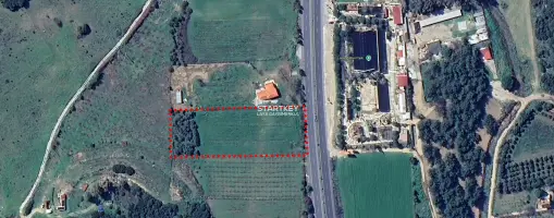 KUŞADASI-SELÇUK KARAYOLUNA CEPHELİ 6.165 m² SATILIK TARLA