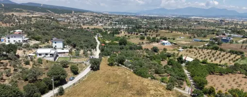 MENDERES AKÇAKÖYDE SATILIK 660 M2 TAPULU SÜPER KONUMDA ELEKTRİĞİ OLAN BAHÇE