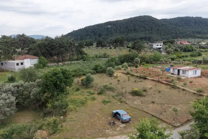 İZMİR ATAKÖYDE SATILIK TEKTAPU 1.066 M2 MUHTEŞEM KONUMDA BAHÇE