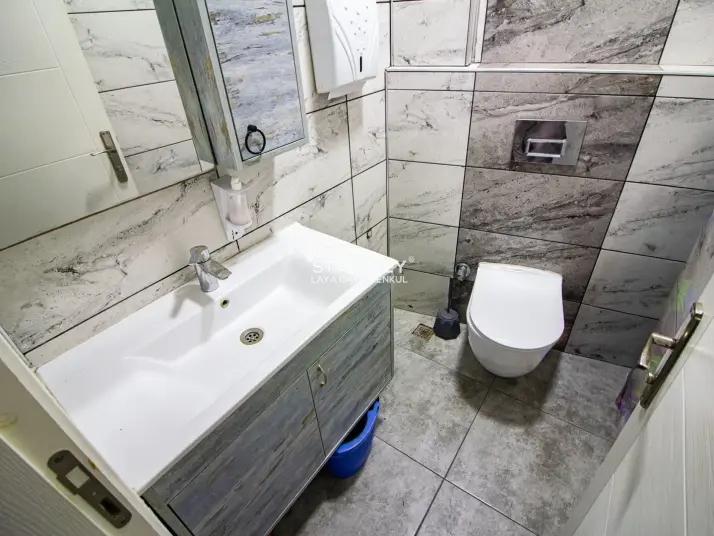 KUŞADASI CUMHURİYET MAHALLESİ’NDE DEPOLU + ÇİFT BAHÇELİ SATILIK DÜKKAN