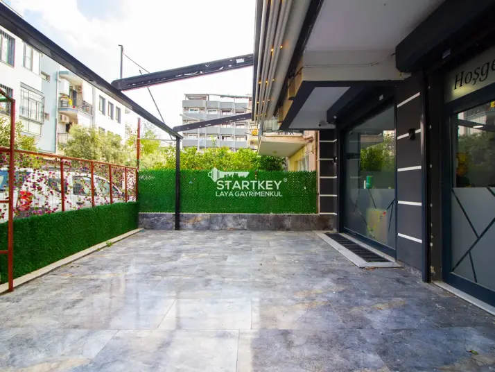 KUŞADASI CUMHURİYET MAHALLESİ’NDE DEPOLU + ÇİFT BAHÇELİ SATILIK DÜKKAN